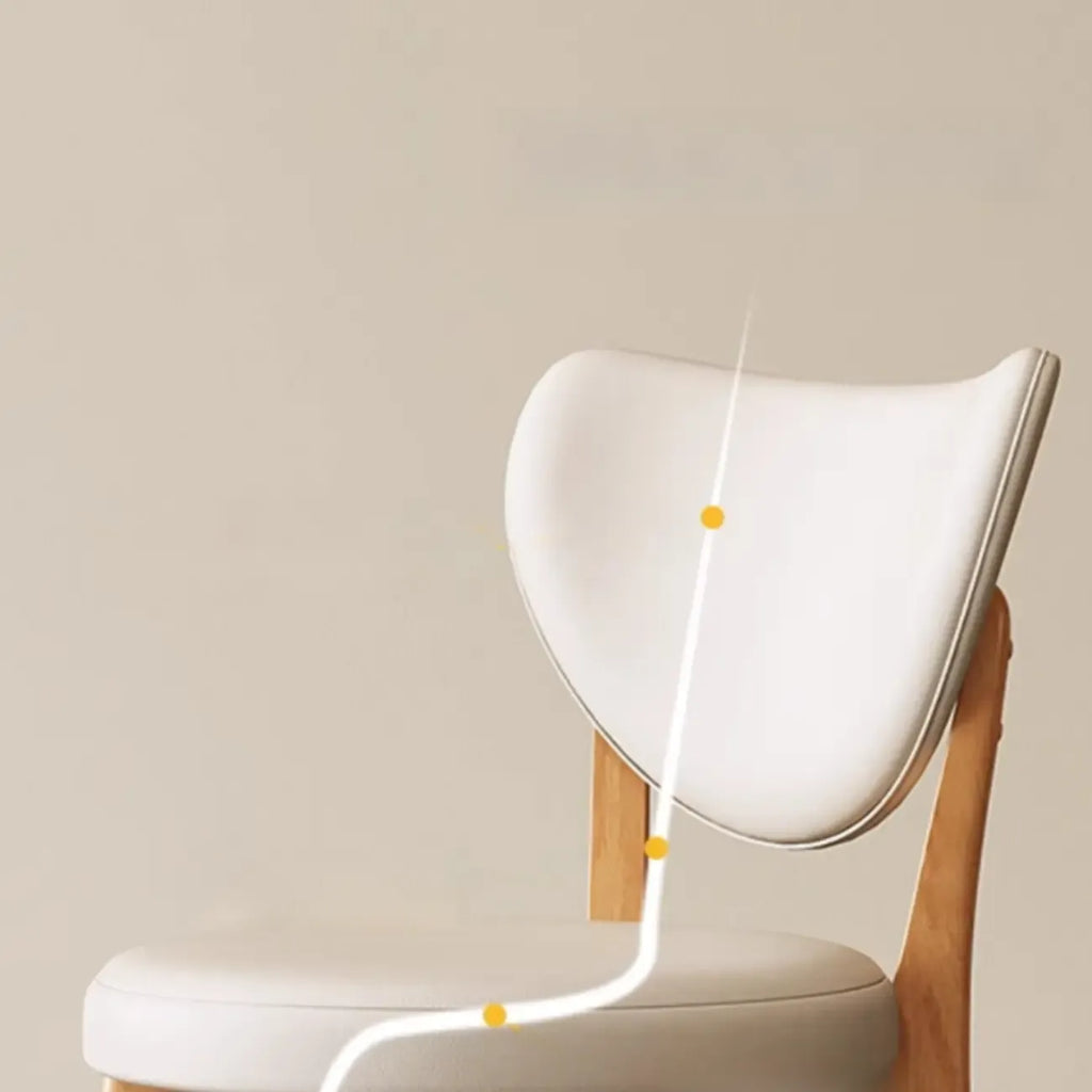 Chaise de salle à manger moderne sans accoudoirs, dossier enveloppant et revêtement en similicuir