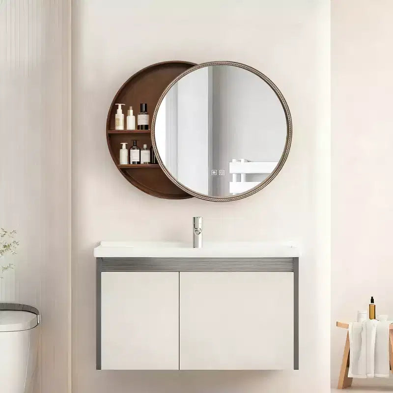 Espejo de pared redondo Norvyn de 23,6 pulgadas de GDFStudio con gabinete de almacenamiento corredizo