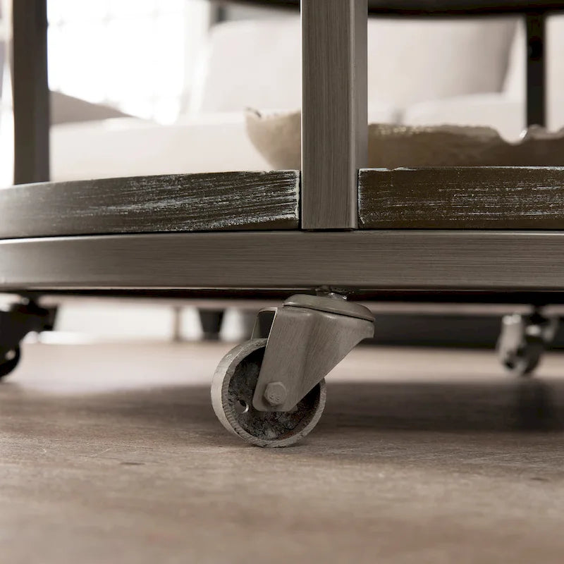 Table basse ronde industrielle rustique en bois Kenya de SEI Furniture avec étagère
