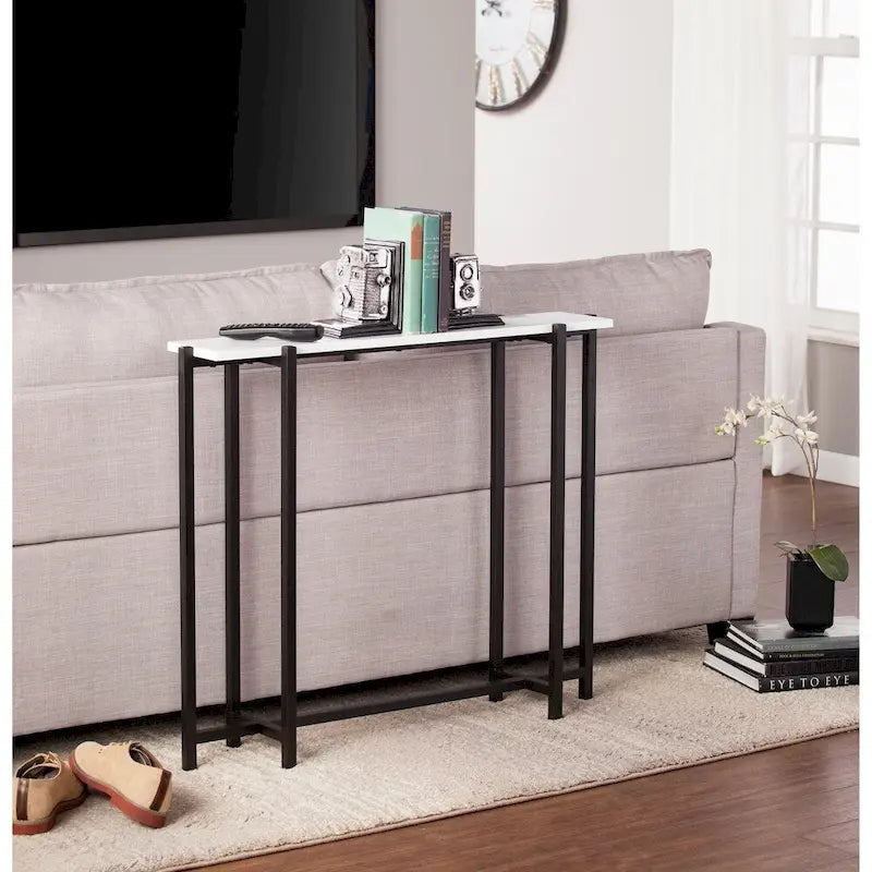 Mesa consola contemporánea estrecha Hedley negra con detalles blancos de SEI Furniture