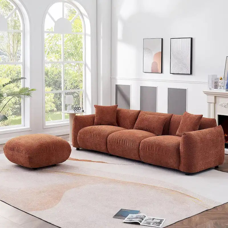 Tapicerowana, wygodna i miękka biała sofa narożna z imitacją puchu jagnięcego i otomaną