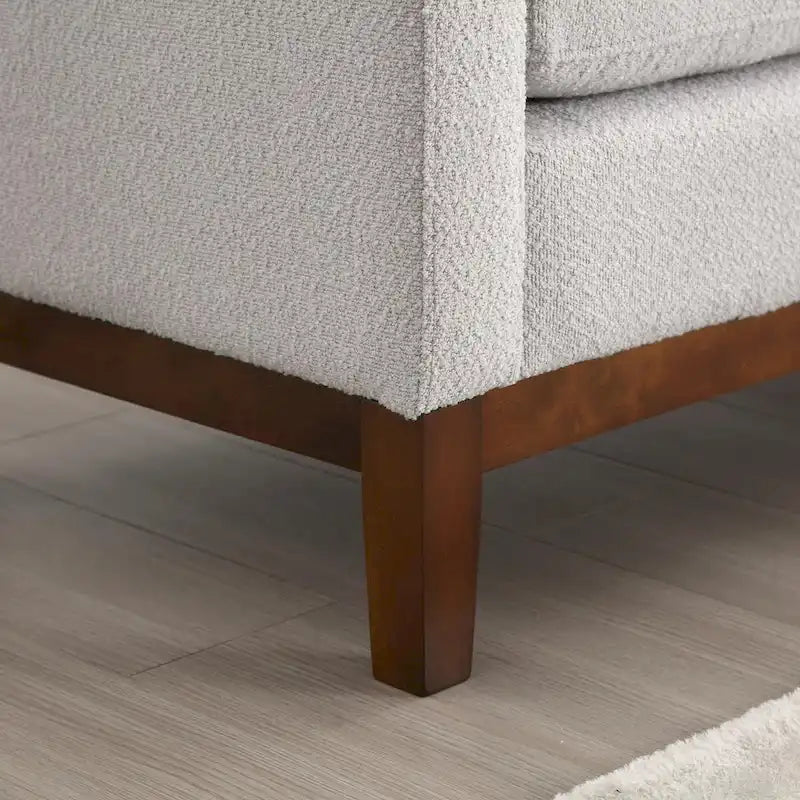 Elegante panca ottomana imbottita da 53.5 con gambe in legno e cuscini cilindrici