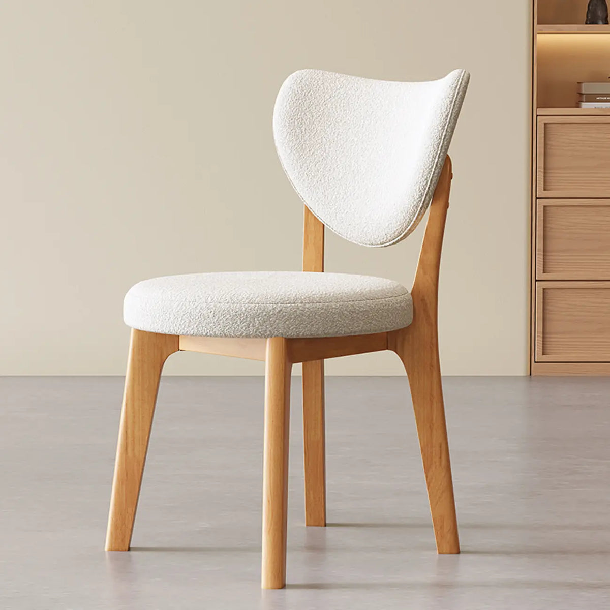 Chaise de salle à manger moderne sans accoudoirs, dossier enveloppant et revêtement en similicuir