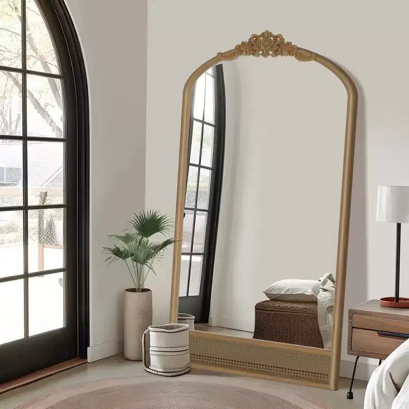 37 in. W x 71 in. H Classic Carved Arch Wood Frame with Rattan Bottom Wall Mirror in Brown