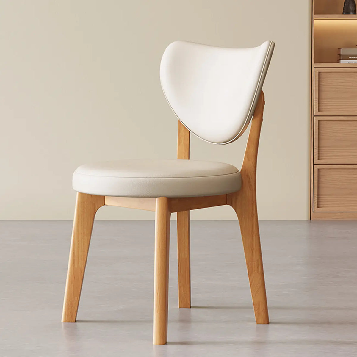 Chaise de salle à manger moderne sans accoudoirs, dossier enveloppant et revêtement en similicuir