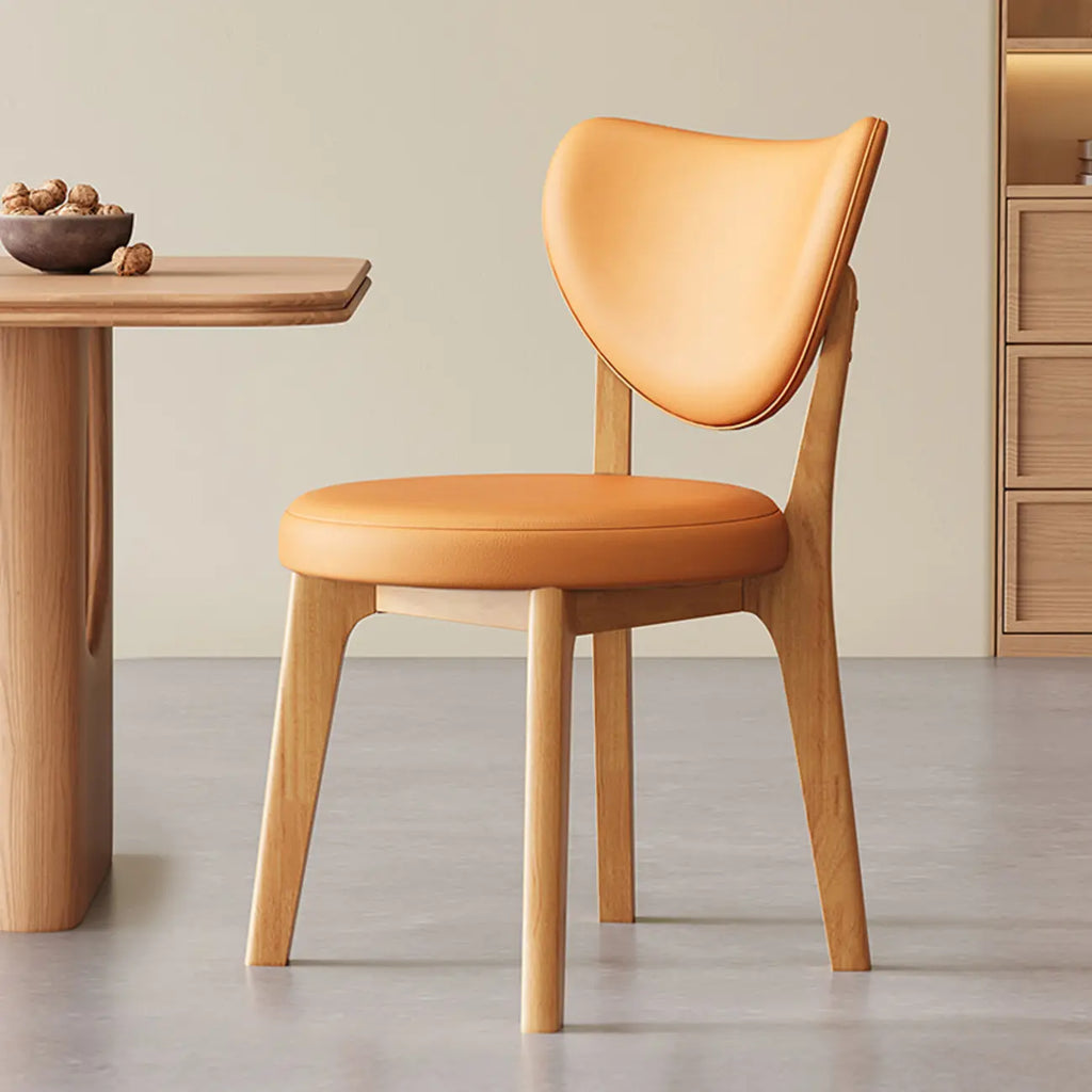 Chaise de salle à manger moderne sans accoudoirs, dossier enveloppant et revêtement en similicuir